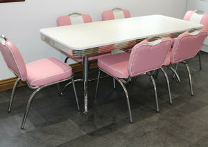 Large Booth Table With Pink Studded Chairs