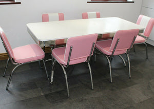 Large Booth Table With Pink Chairs
