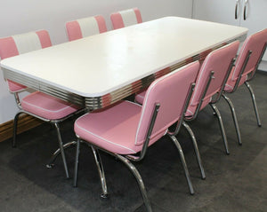 Large Booth Table With Pink Chairs