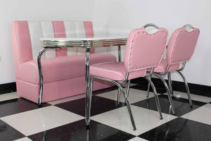 Pink Booth, 2 Chairs and White Four Legged Table